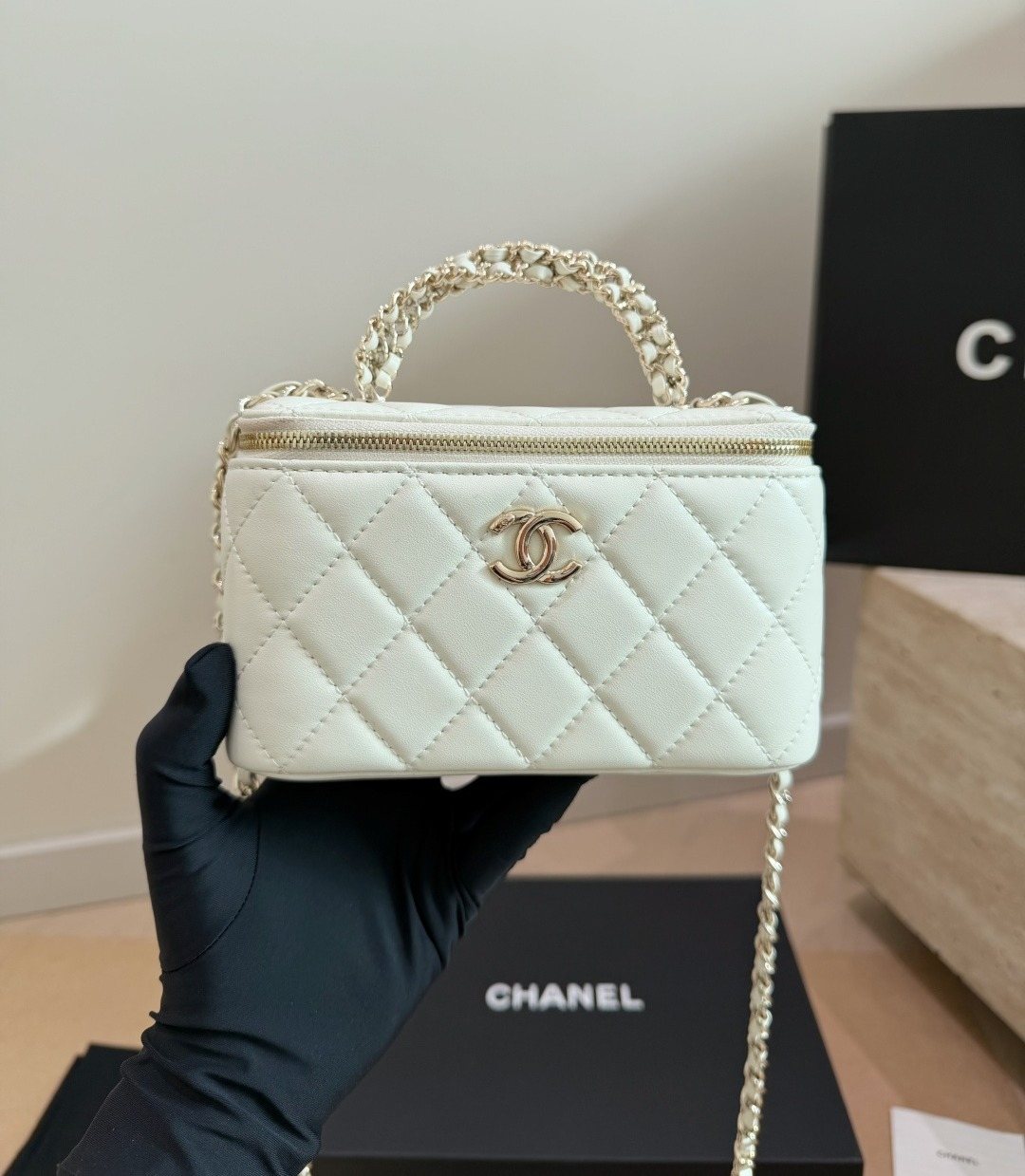 Chanel Quilted Top-Handle Box Bag — model