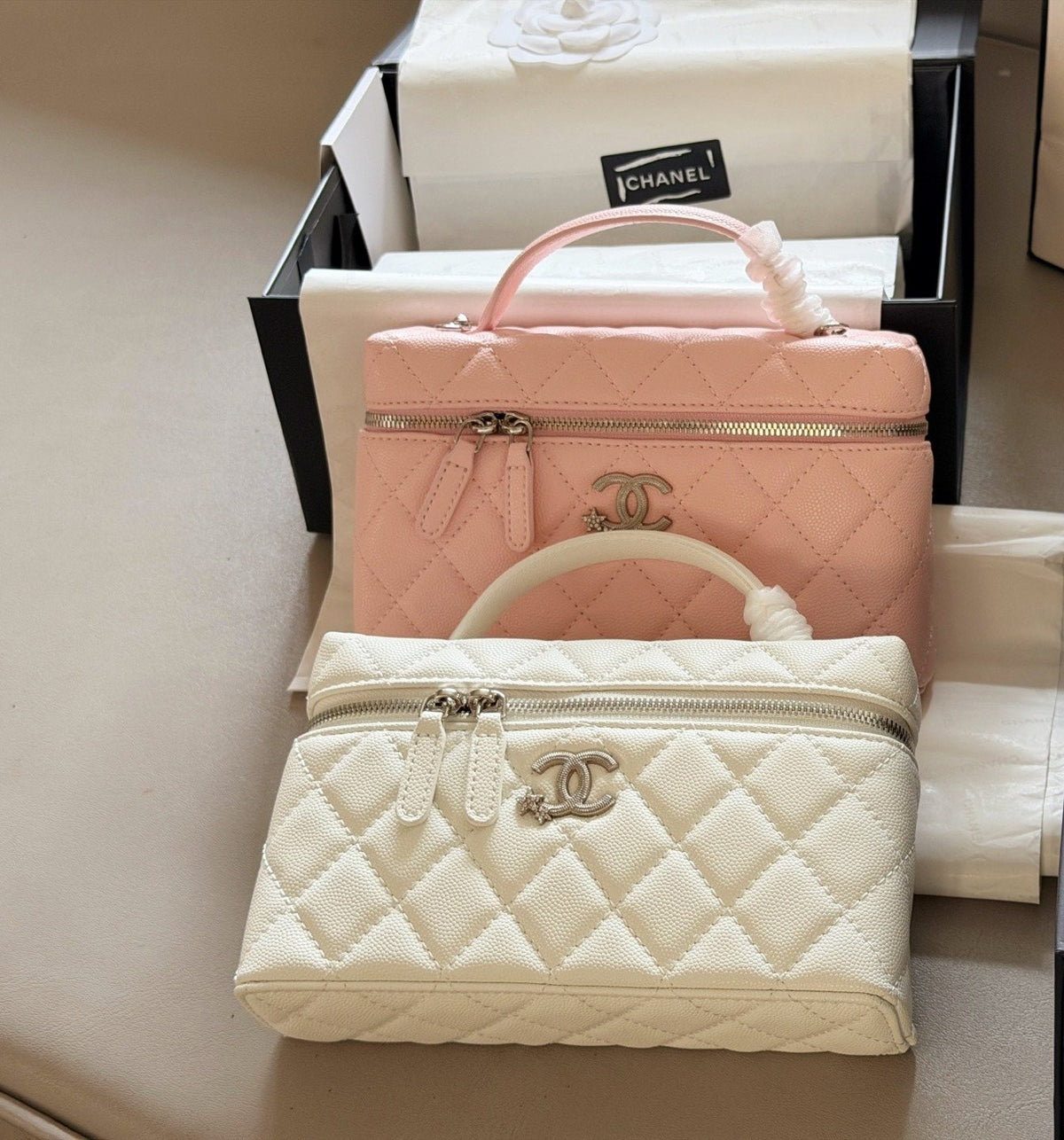 Chanel Diamond-Quilted Top-Handle Box Bag — comparison