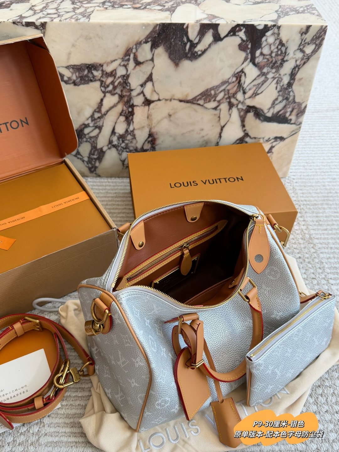 Louis Vuitton Speedy Silver Monogram Barrel Bag — detail