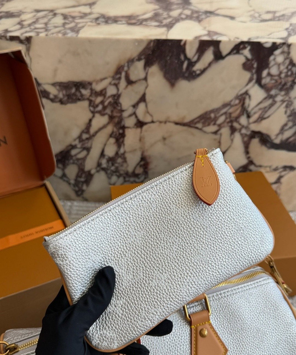 Louis Vuitton Speedy Silver Monogram Barrel Bag — detail