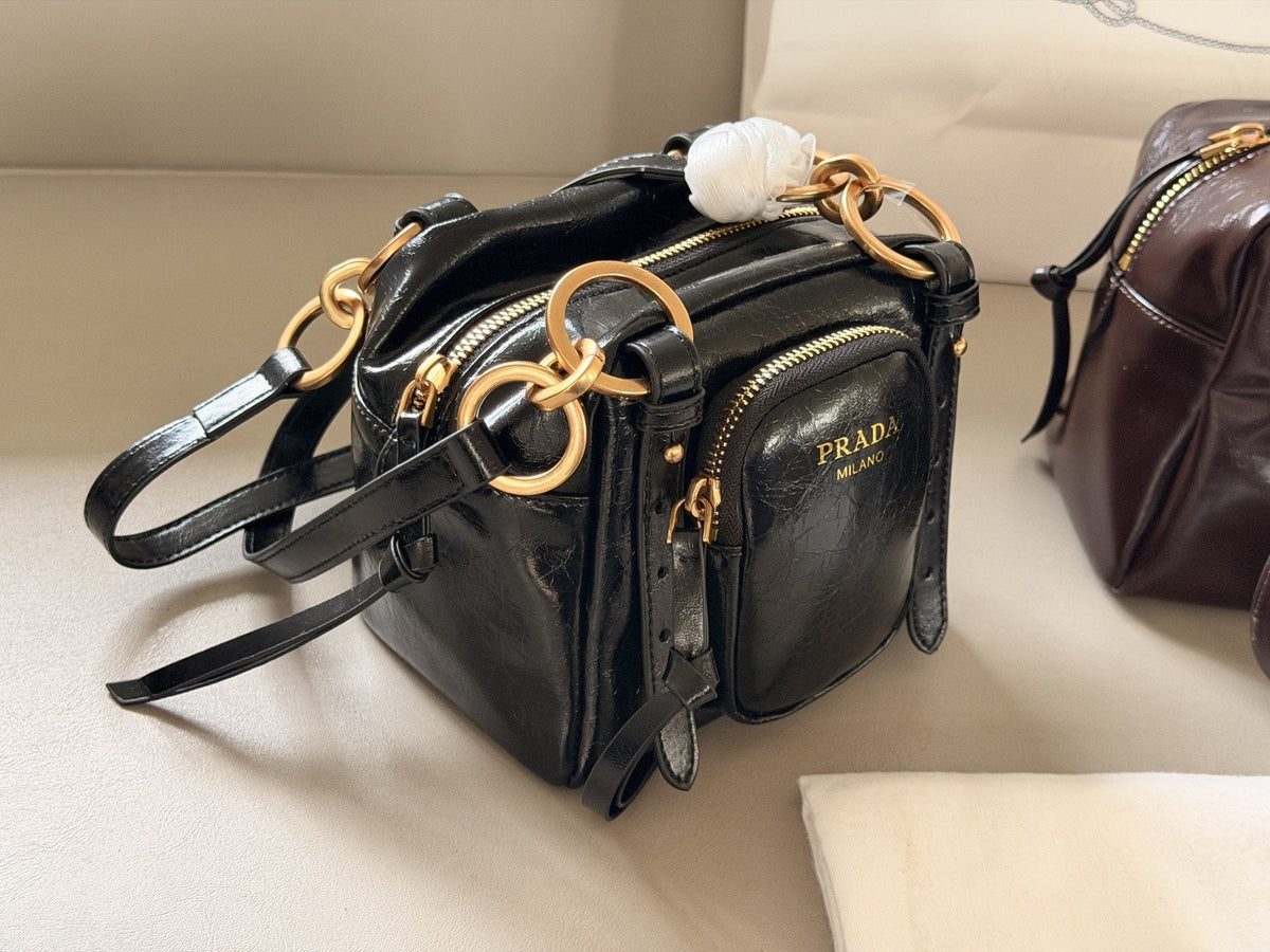 Prada Glossy Front-Pocket Top-Handle Bag — hero