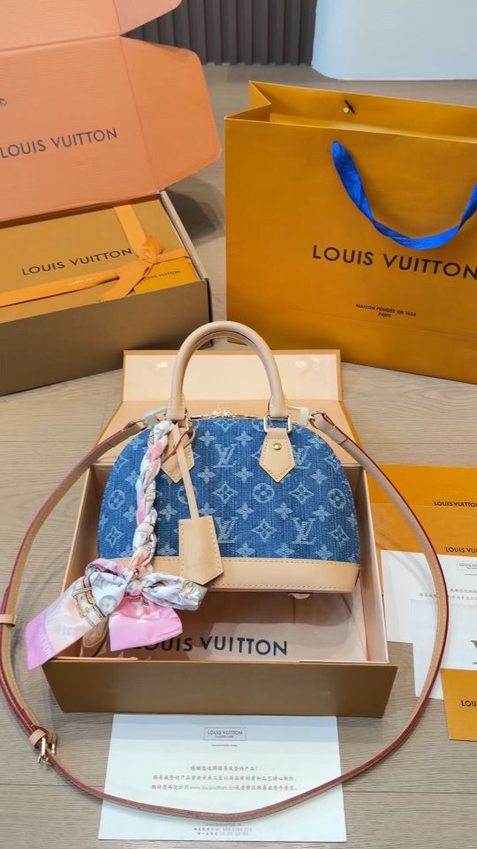 Louis Vuitton Alma BB Monogram Denim Handbag — hero