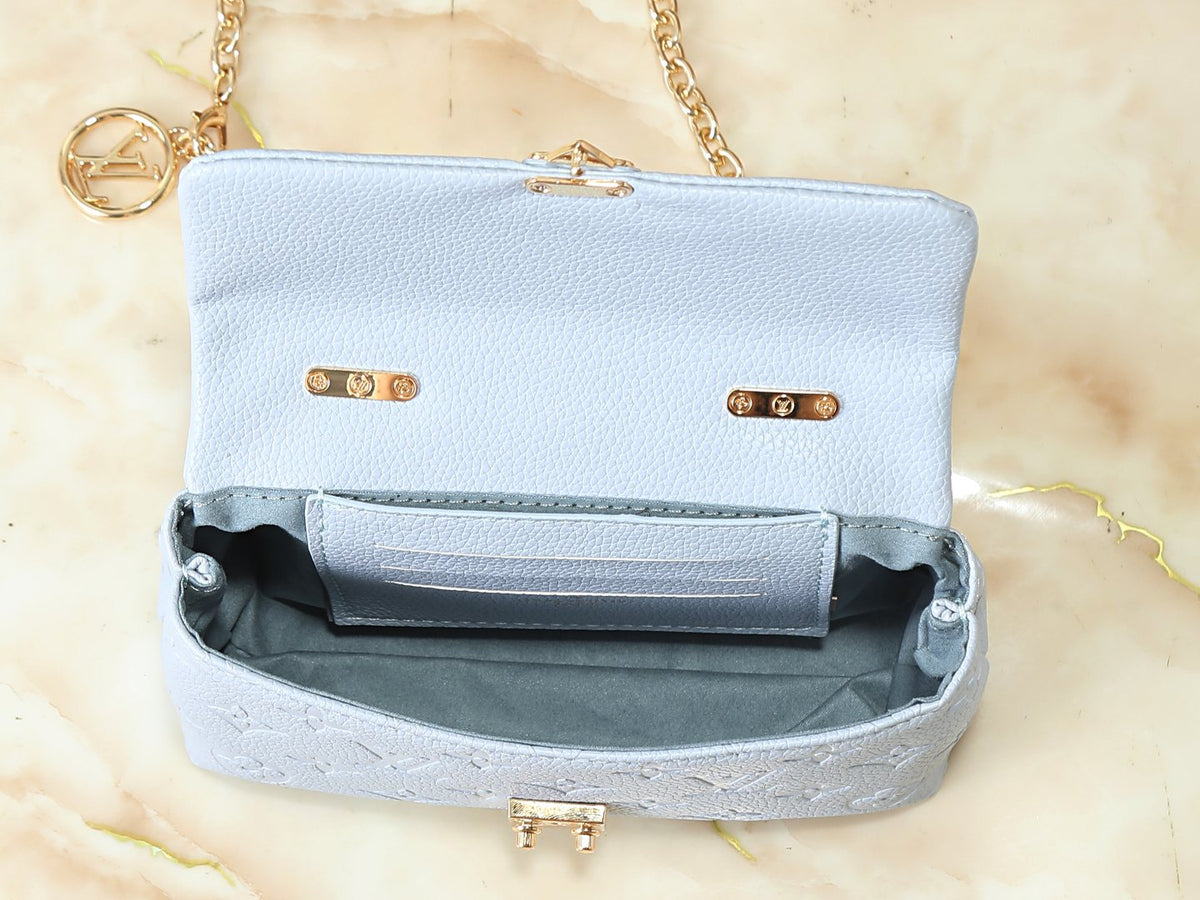 Louis Vuitton Nano Madeleine Monogram Empreinte Handbag — detail