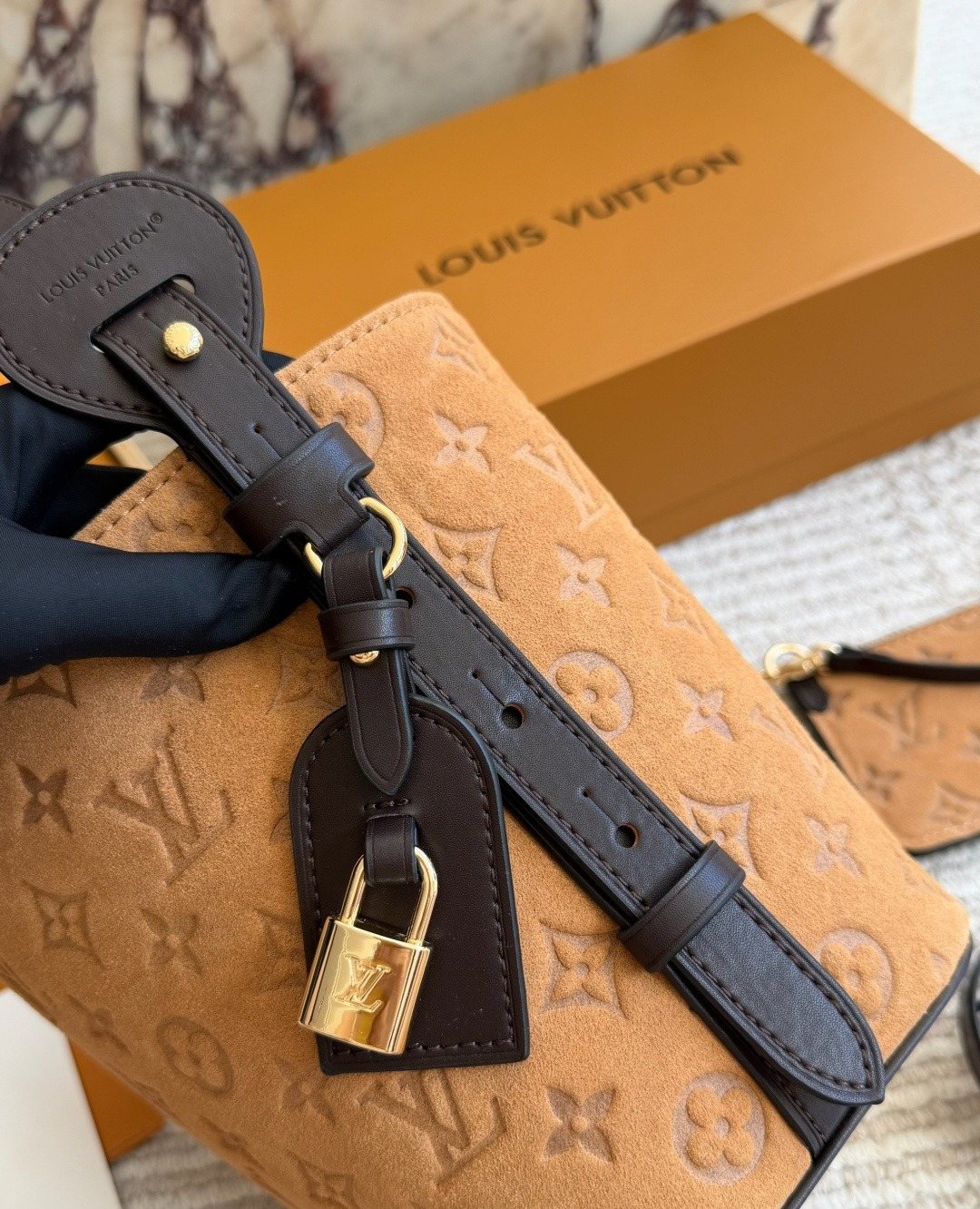 Louis Vuitton Tan Embossed Monogram Bucket Bag — detail