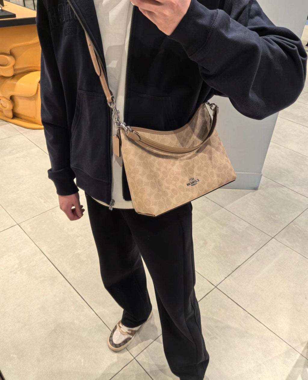 Coach Laurel Signature Print Hobo Bag — model