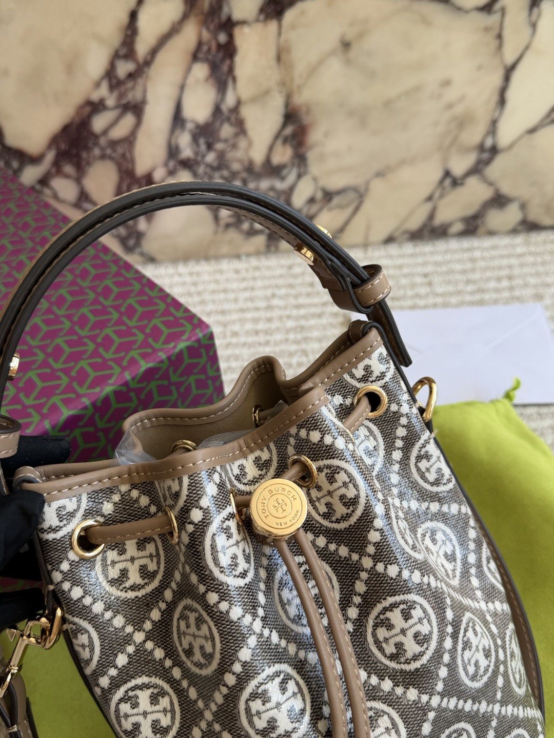 Circular Motif Drawstring Bucket Bag — detail