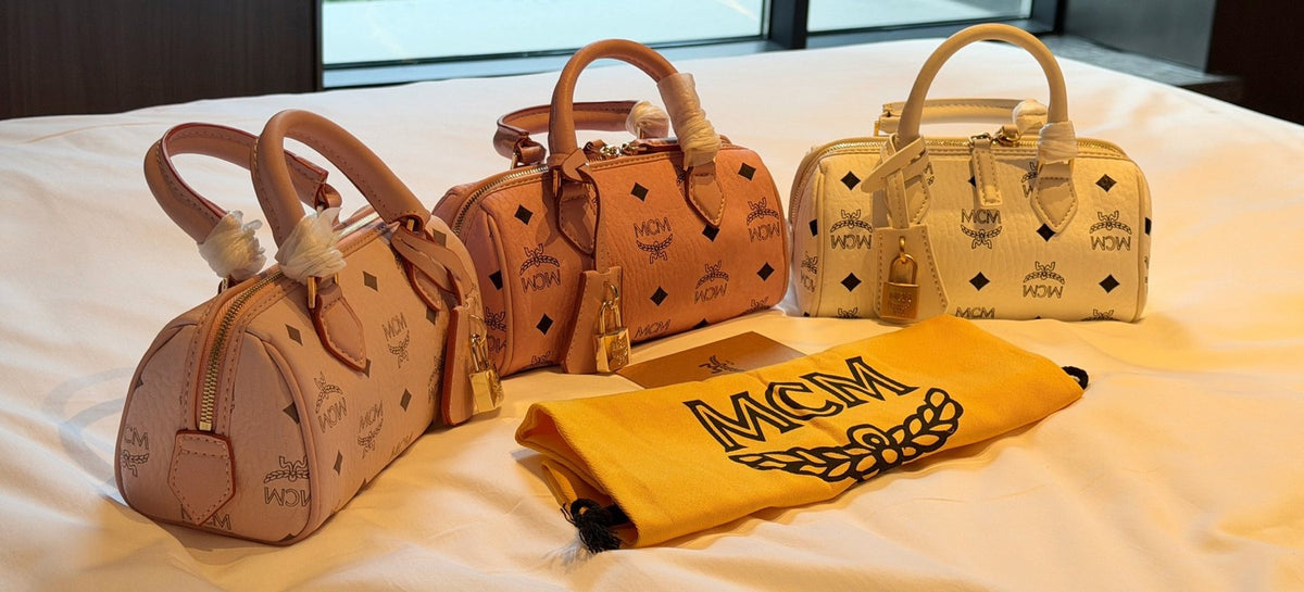 MCM Boston Printed Satchel Bag — comparison