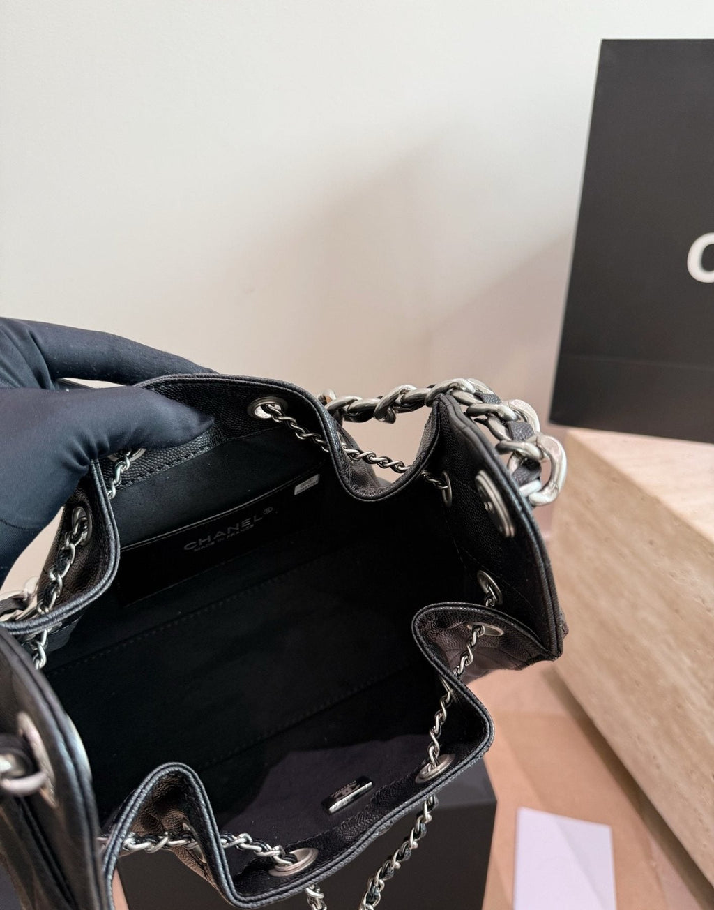 Chanel 25 Quilted Drawstring Bucket Bag — detail