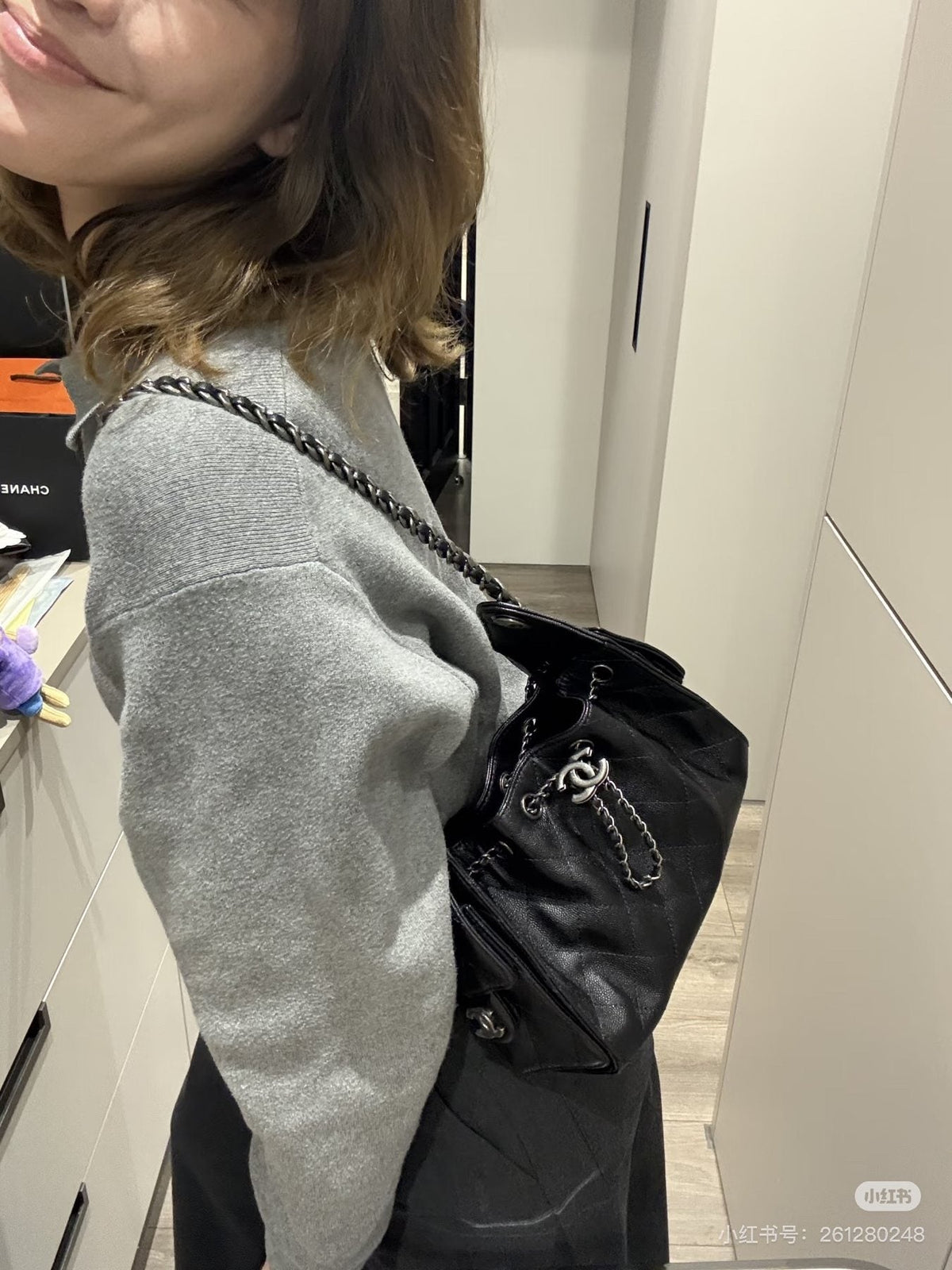 Chanel 25 Quilted Drawstring Bucket Bag — model