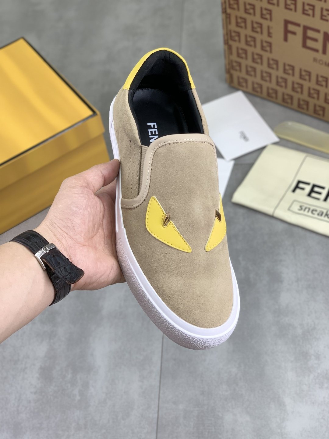 Fendi Eye-Accent Slip-On Sneakers — model