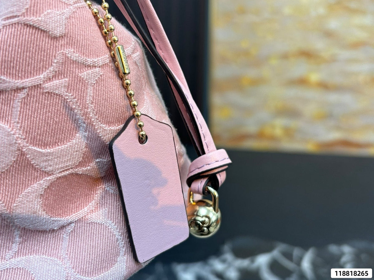 Coach Pink C-Pattern Drawstring Bucket Bag — detail