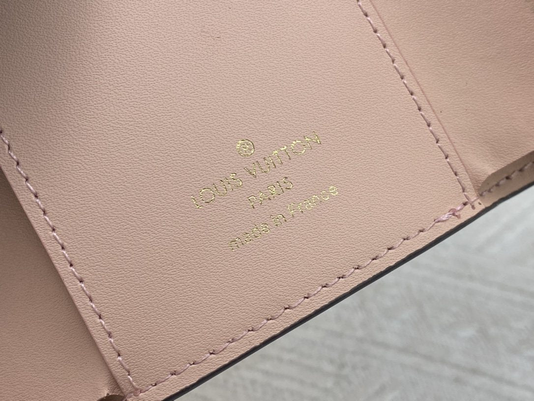 Louis Vuitton Monogram Trunk-Clasp Compact Wallet — detail