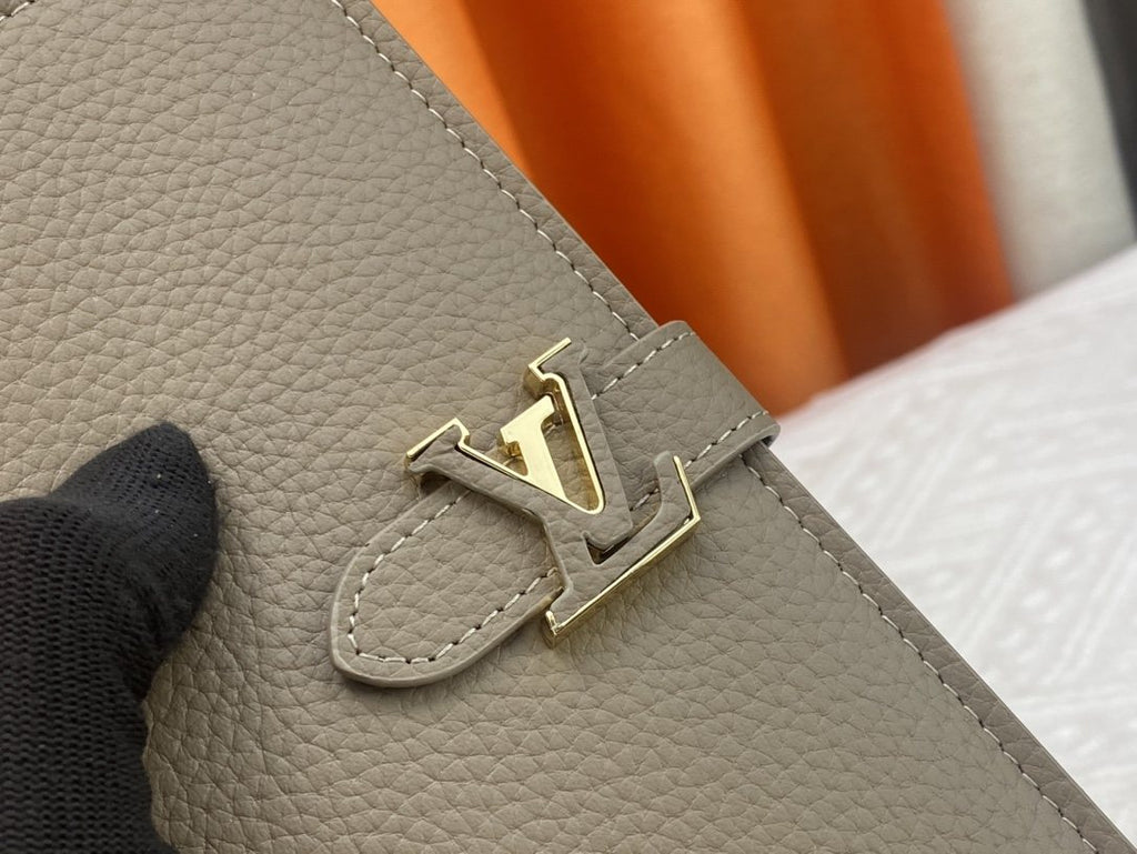 Louis Vuitton Vertical Grained Leather Wallet — detail