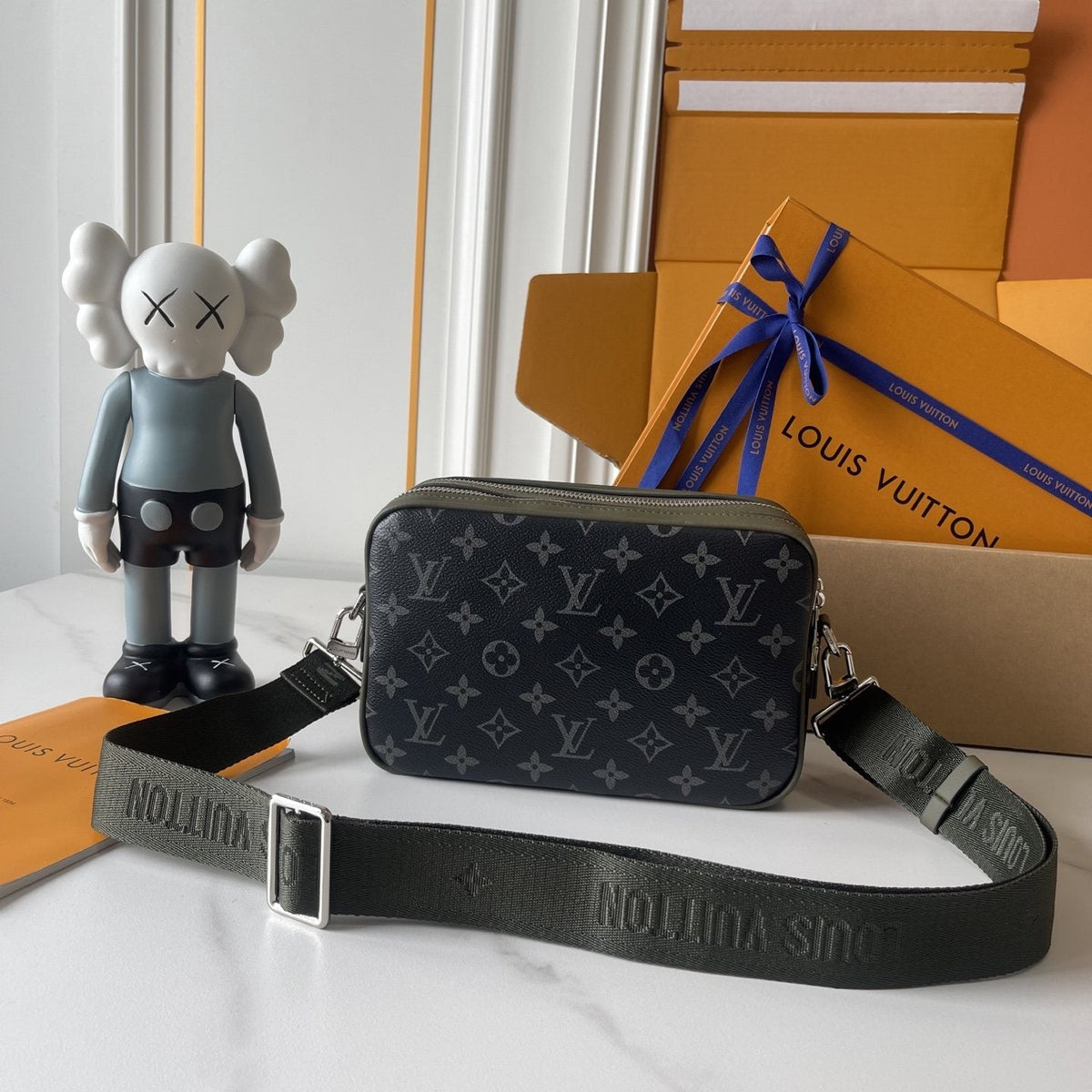 Louis Vuitton Alpha Monogram Messenger Bag — back