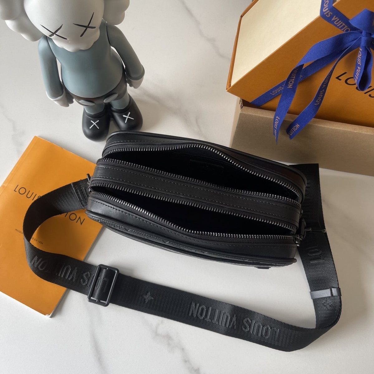 Louis Vuitton Alpha Monogram Messenger Bag — front