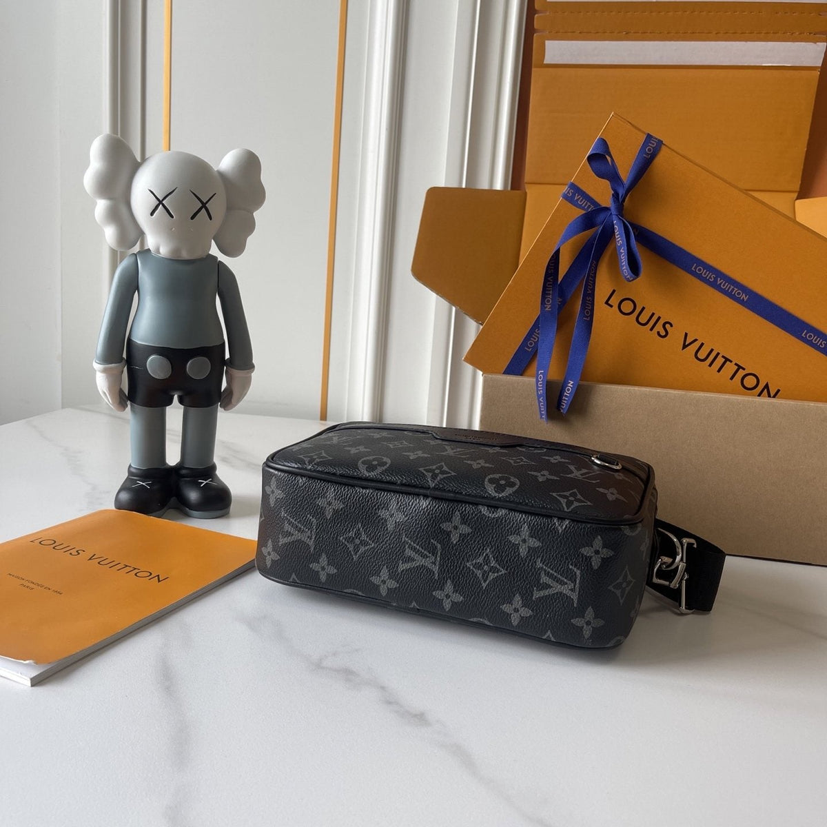 Louis Vuitton Alpha Monogram Messenger Bag — side