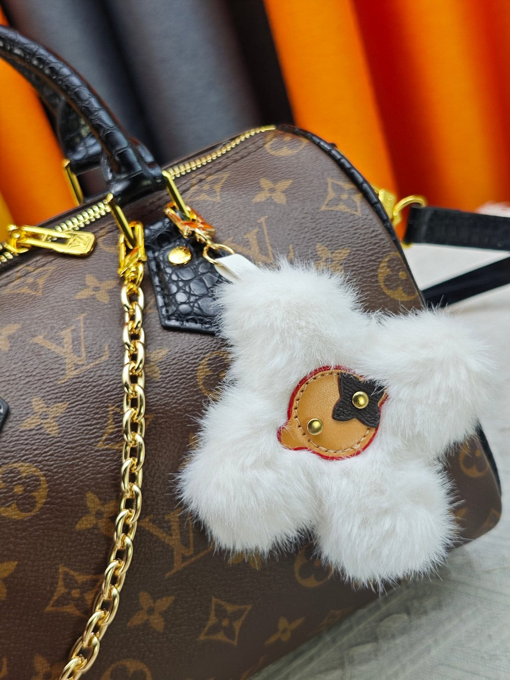Louis Vuitton Speedy Bandoulière Monogram Satchel with Flower Ornament — detail