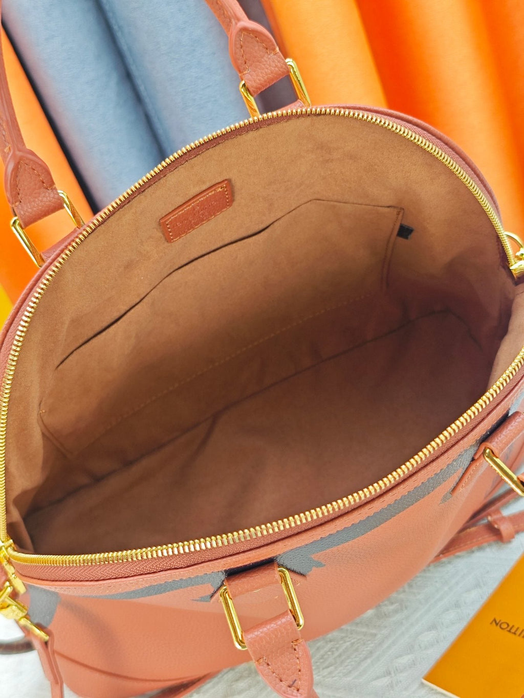 Louis Vuitton Alma Soft Cognac Top-Handle Bag — detail