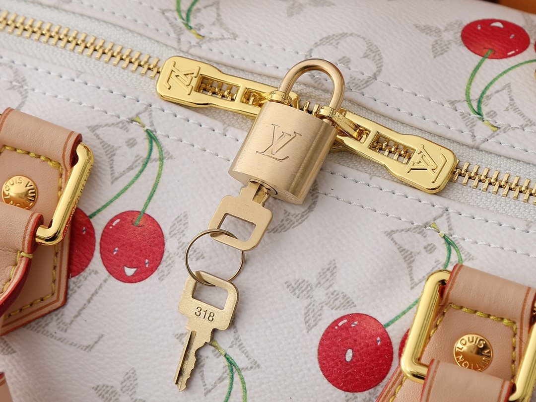 Louis Vuitton Speedy Soft Monogram Top-Handle Bag — detail