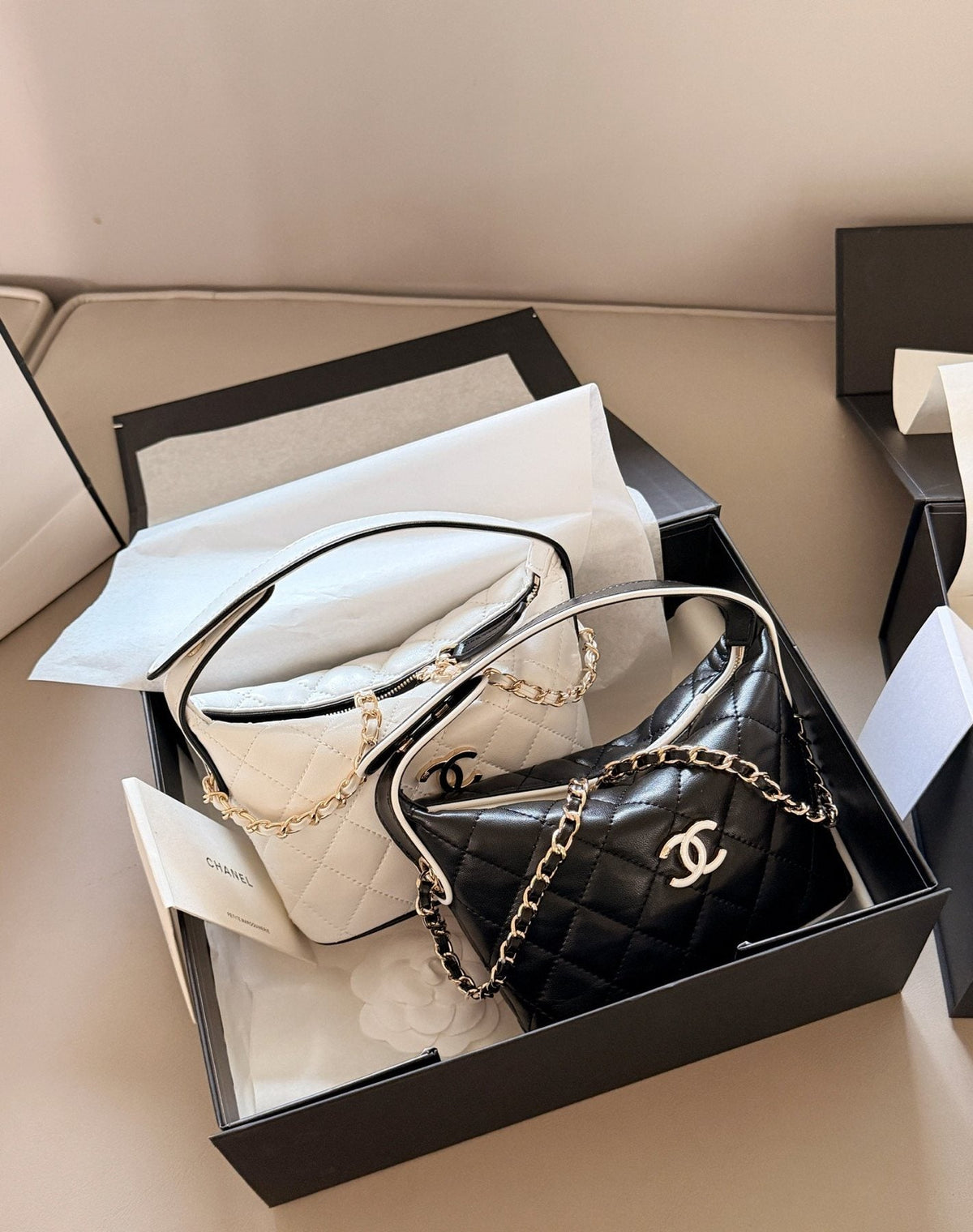 Chanel Quilted Box Top-Handle Bag — comparison