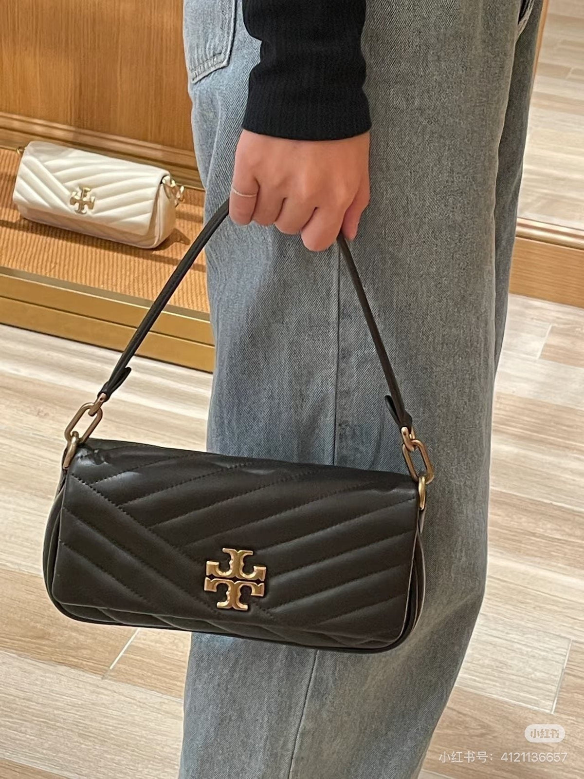Tory Burch Kira Chevron-Quilted Baguette Bag — model