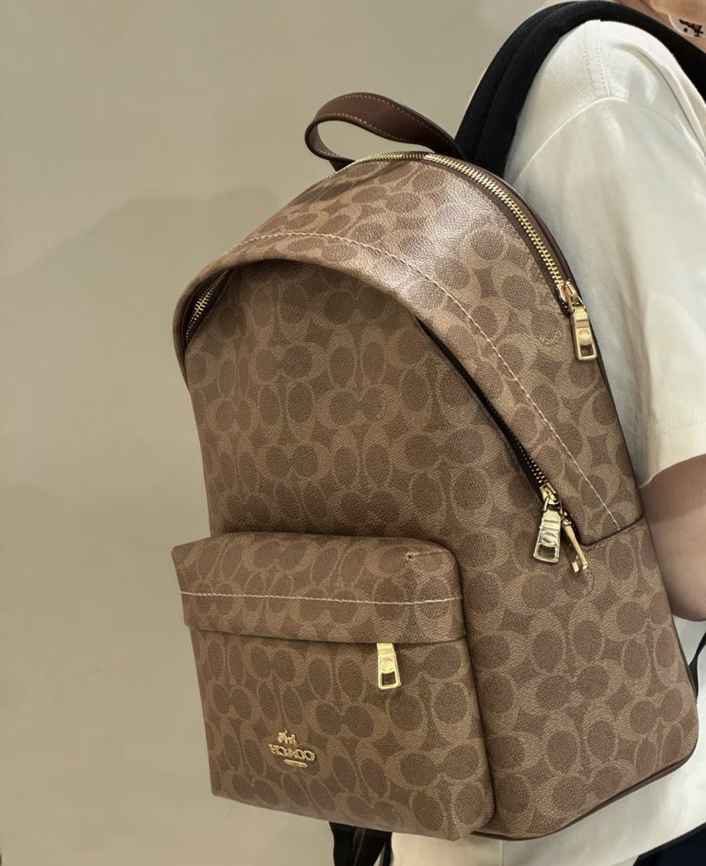 Coach Taylor Monogram Zip-Pocket Backpack — model