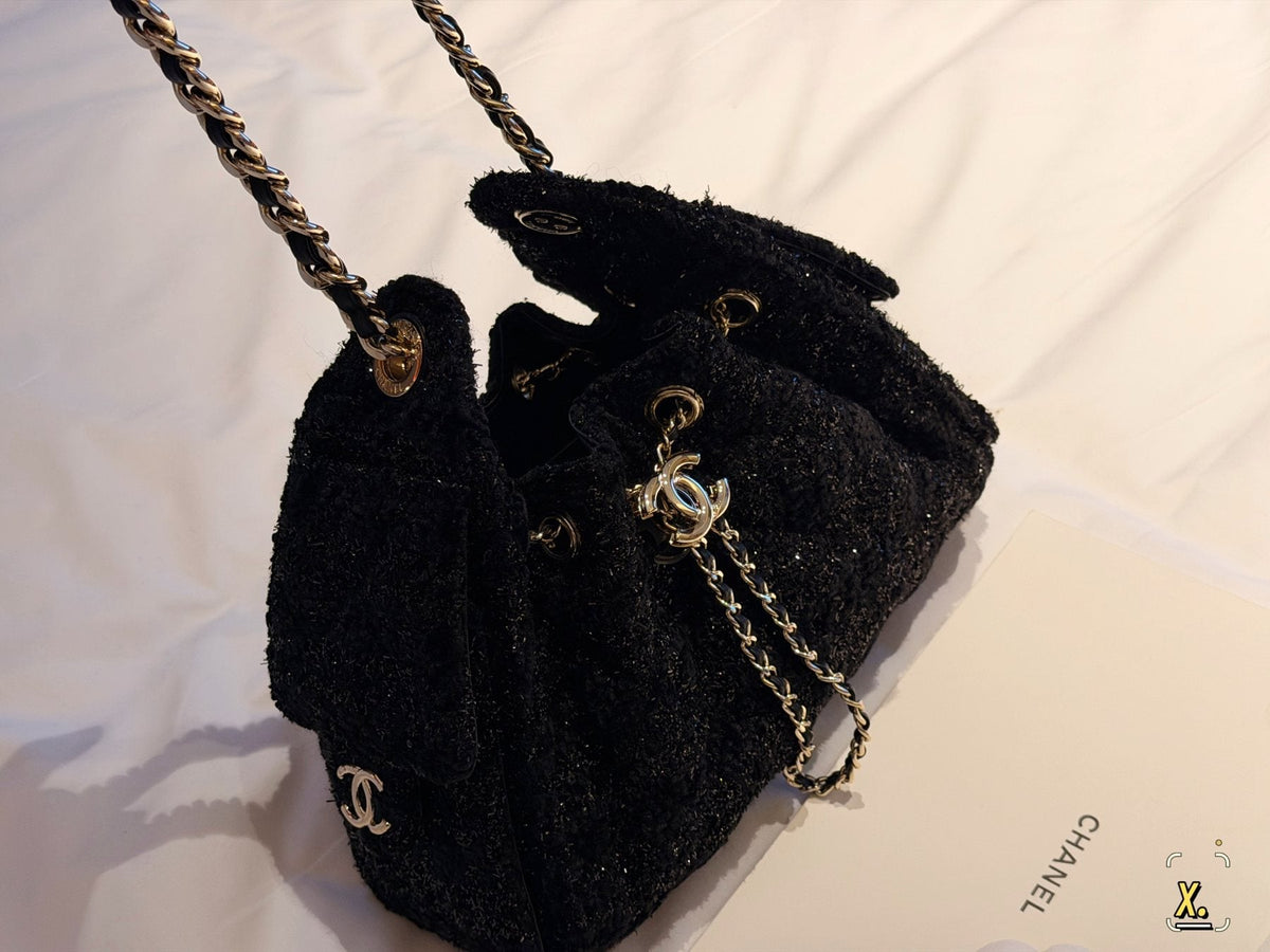 Chanel 25 Drawstring Shoulder Bag — side