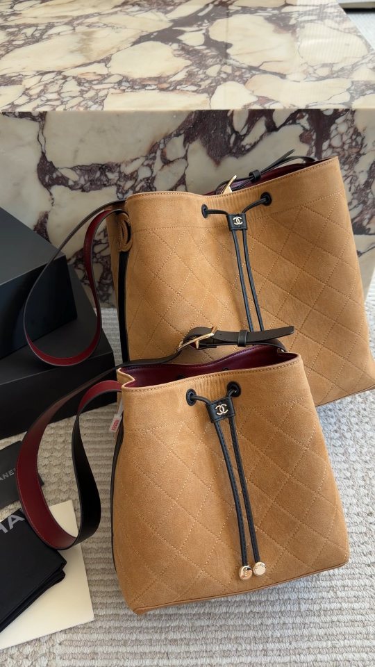 Chanel Diamond-Pattern Drawstring Bucket Bag — comparison