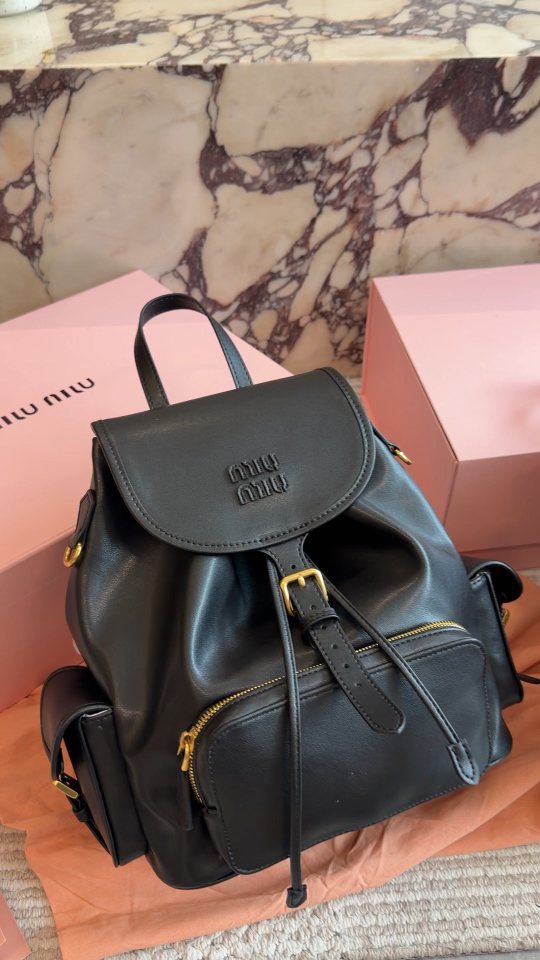 Miu Miu Buckled Flap Backpack — hero
