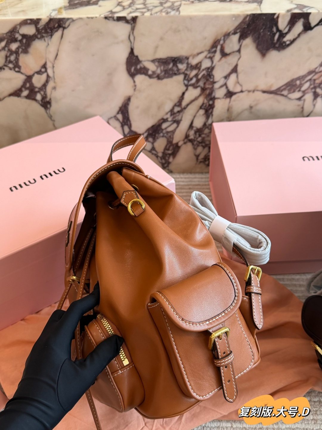 Miu Miu Buckled Flap Backpack — side