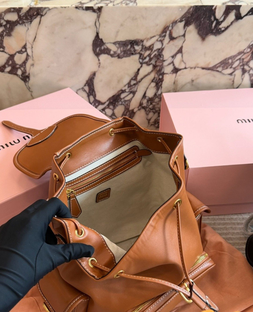 Miu Miu Buckled Flap Backpack — detail