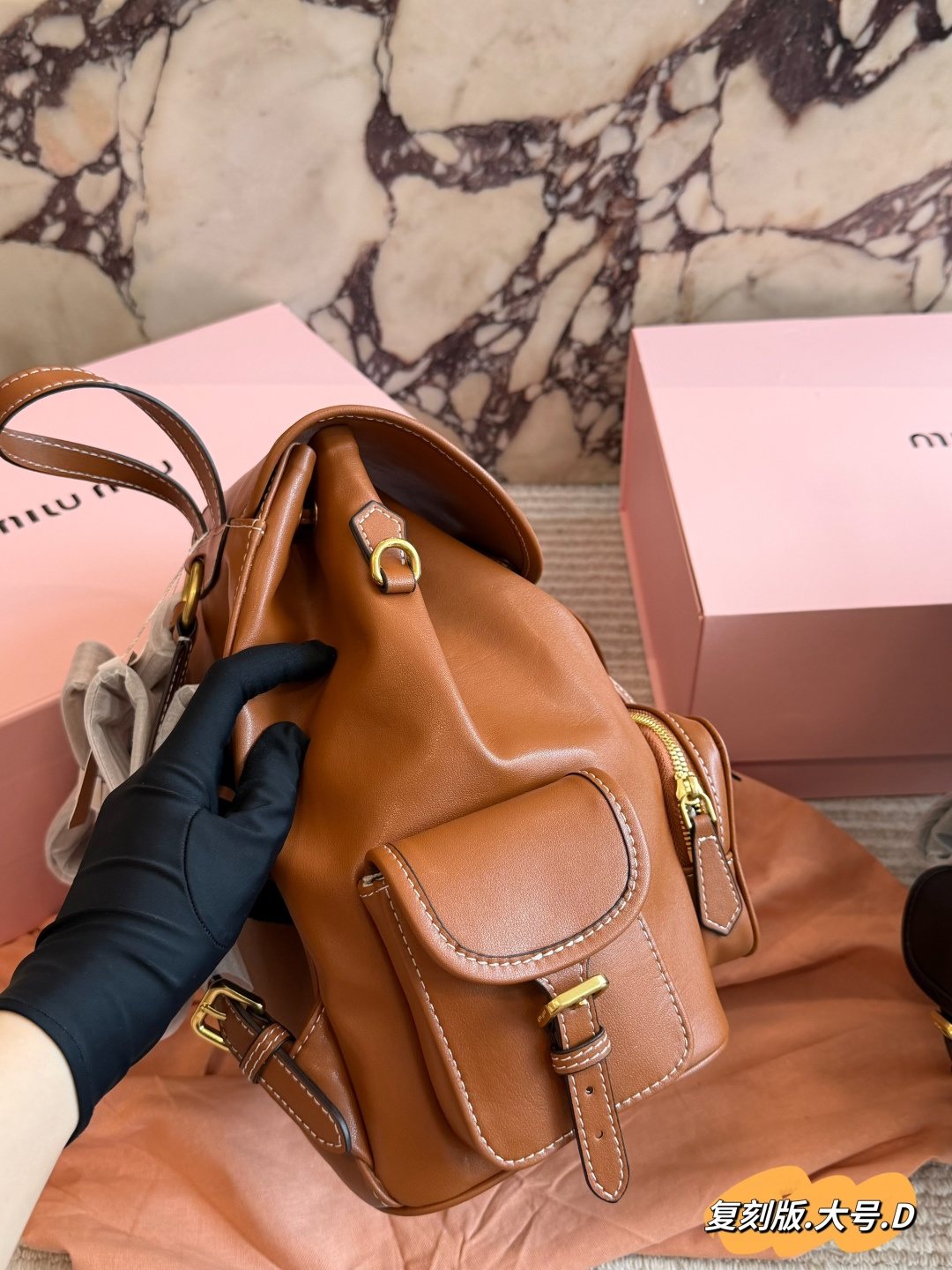 Miu Miu Buckled Flap Backpack — side