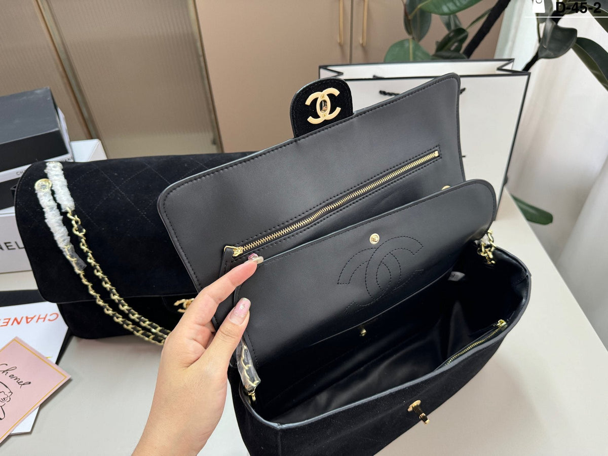 Chanel Maxi Flap Quilted Shoulder Bag — front
