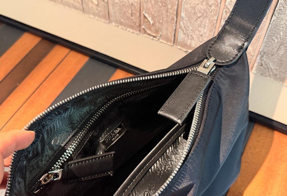 Prada Rounded Top Handle Shoulder Bag — detail