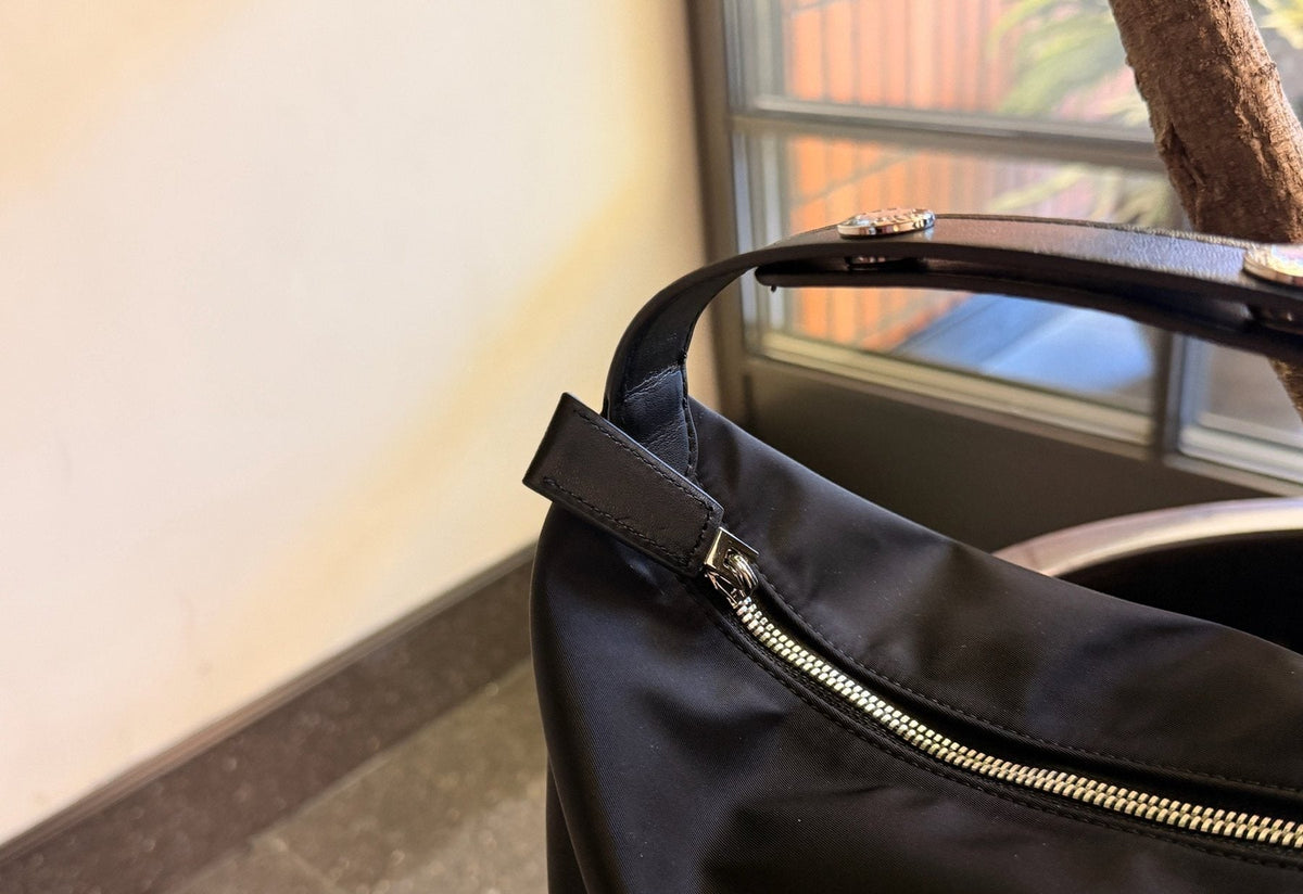Prada Rounded Top Handle Shoulder Bag — detail