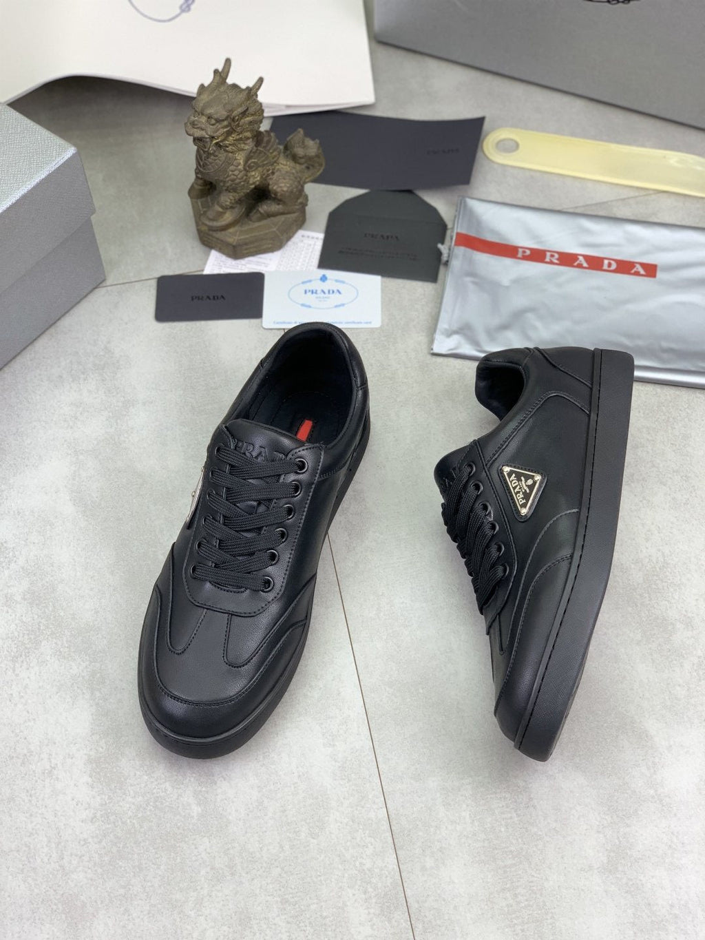 Prada Paneled Low-Top Sneakers — side