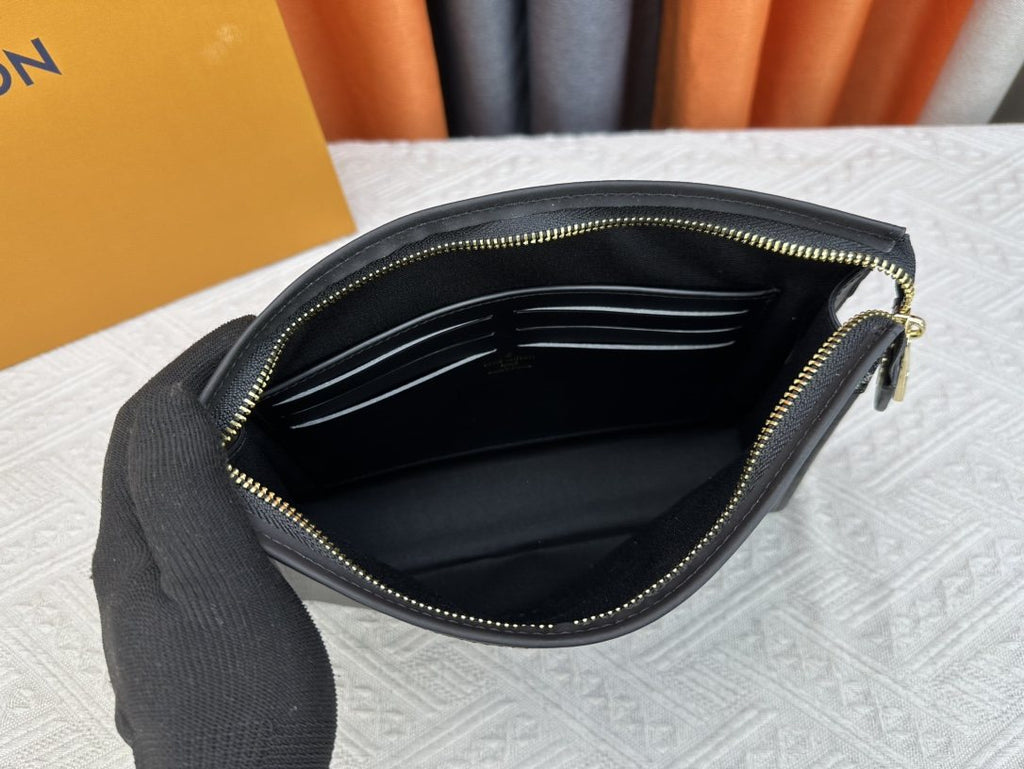 Louis Vuitton Pochette Voyage Monogram Heart Clutch — front
