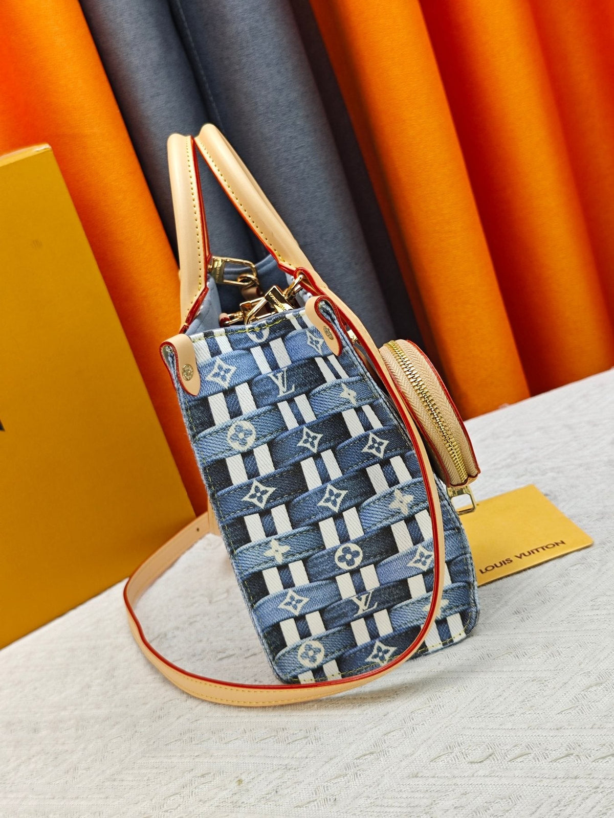 Louis Vuitton OnTheGo Patterned Tote with Round Pouch — side