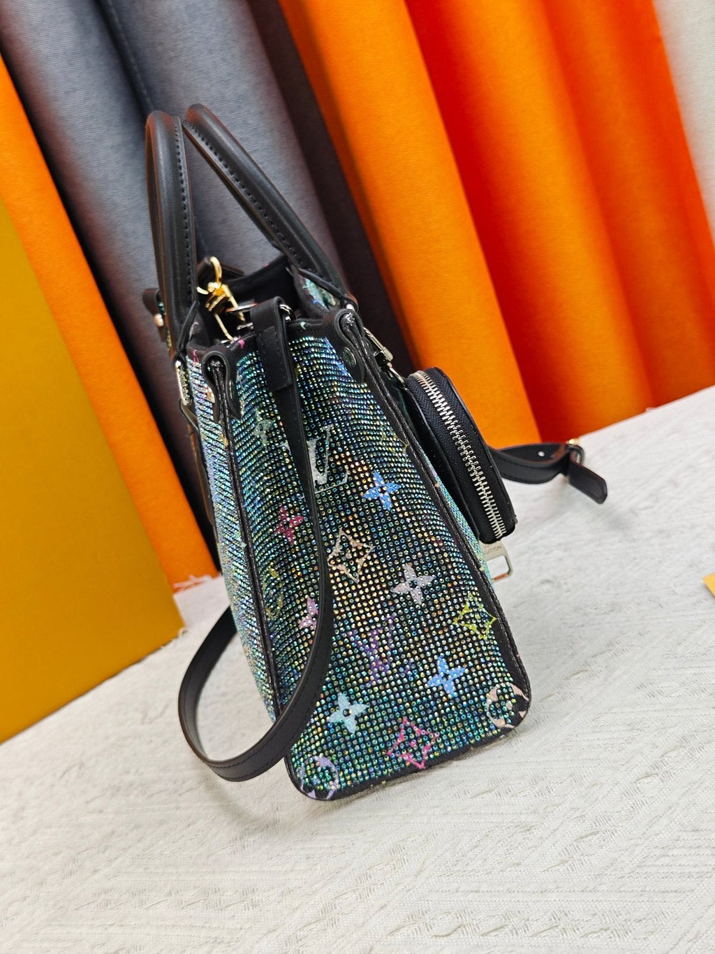 Louis Vuitton OnTheGo Patterned Tote with Round Pouch — side