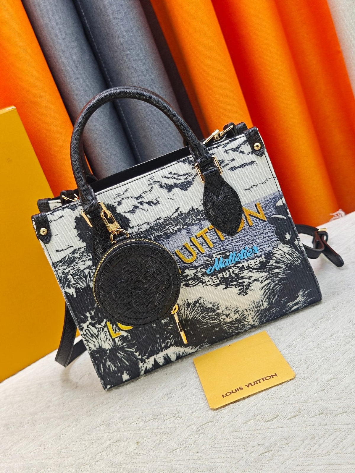 Louis Vuitton OnTheGo Patterned Tote with Round Pouch — front