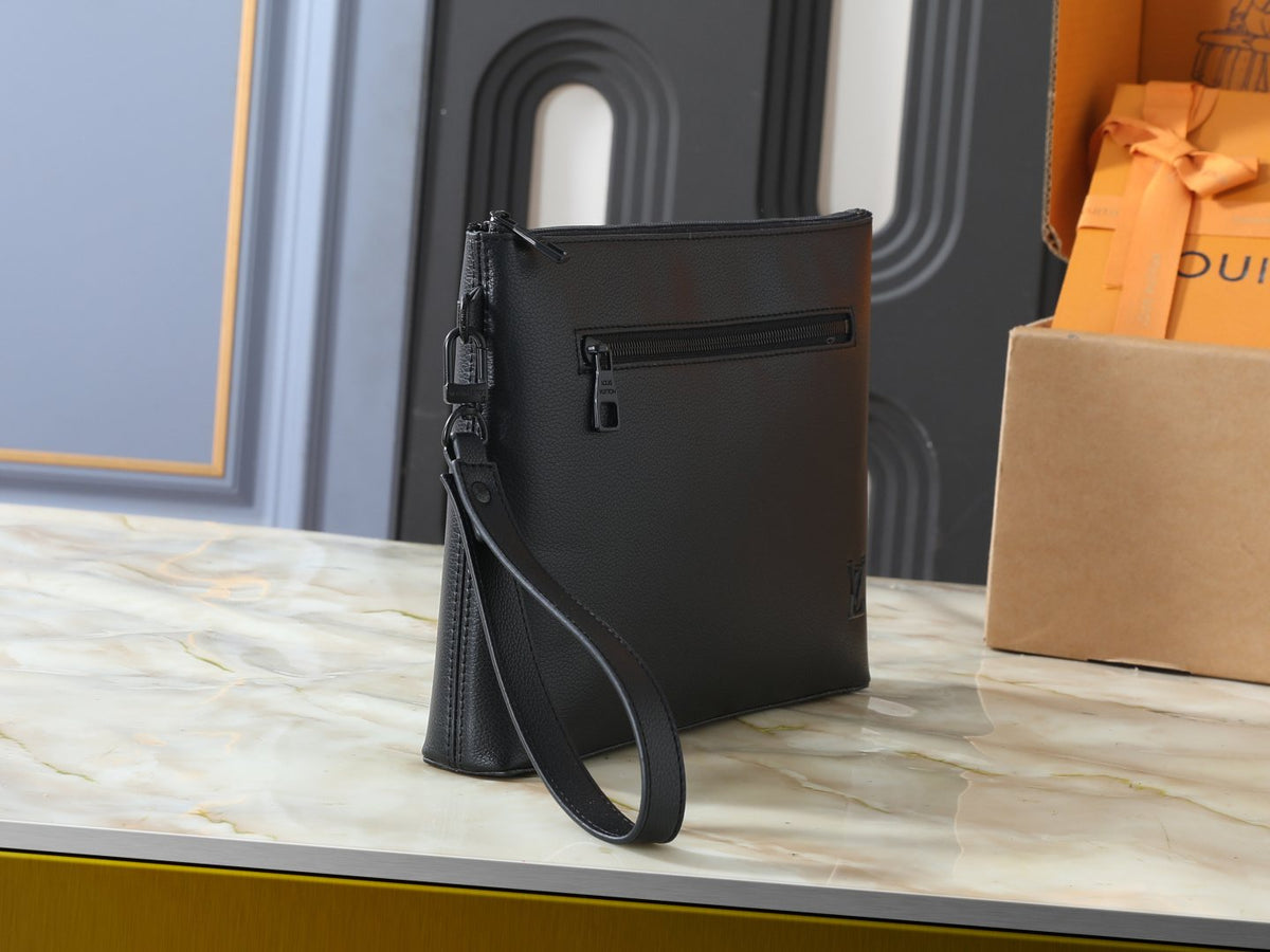Louis Vuitton Takeoff Leather Wristlet Clutch — side
