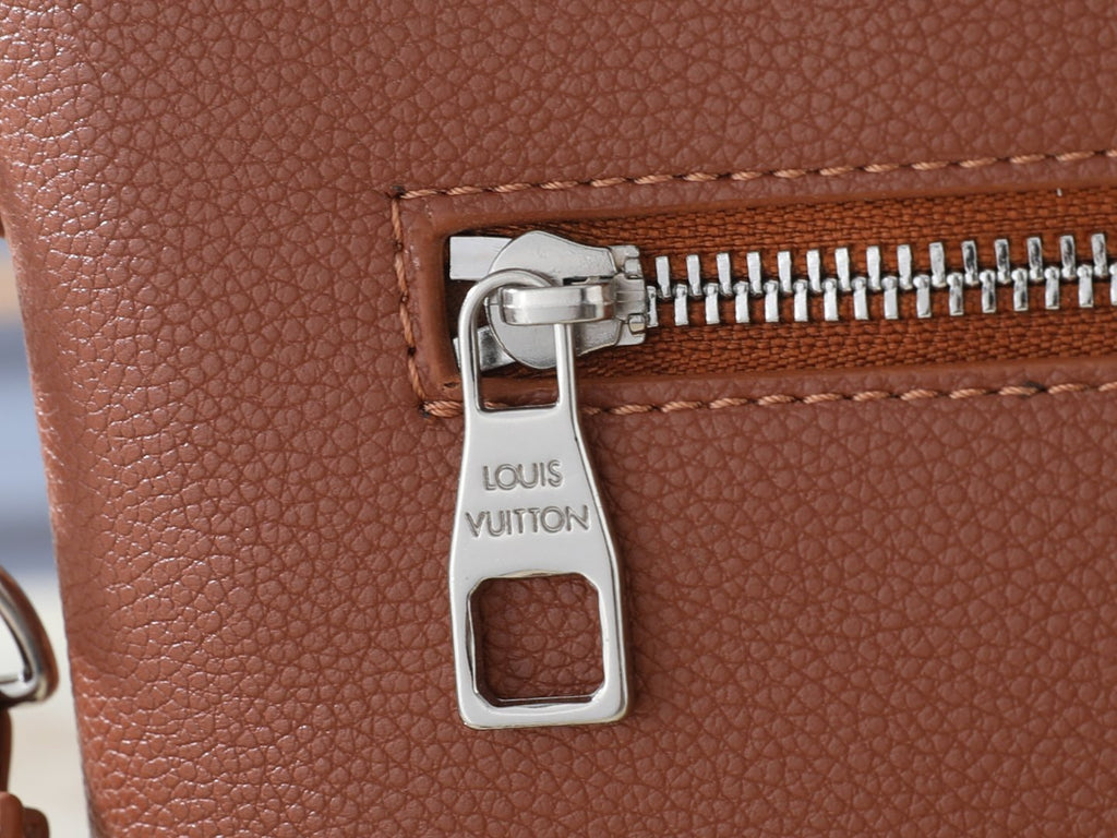 Louis Vuitton Takeoff Leather Wristlet Clutch — detail