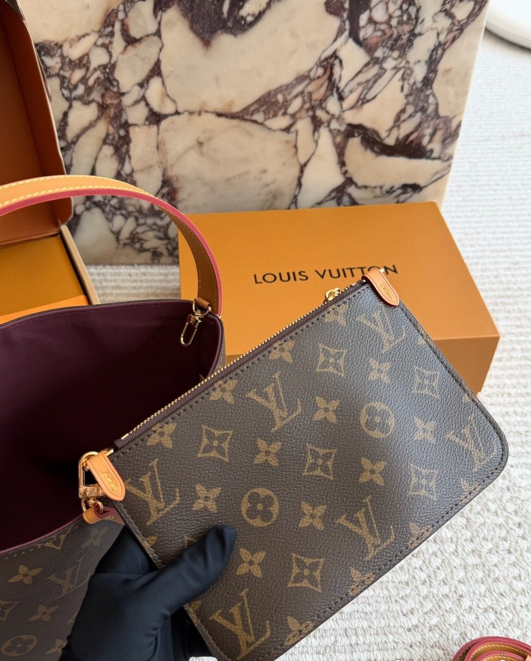 Louis Vuitton Monogram Buckle-Strap Bucket Bag — detail