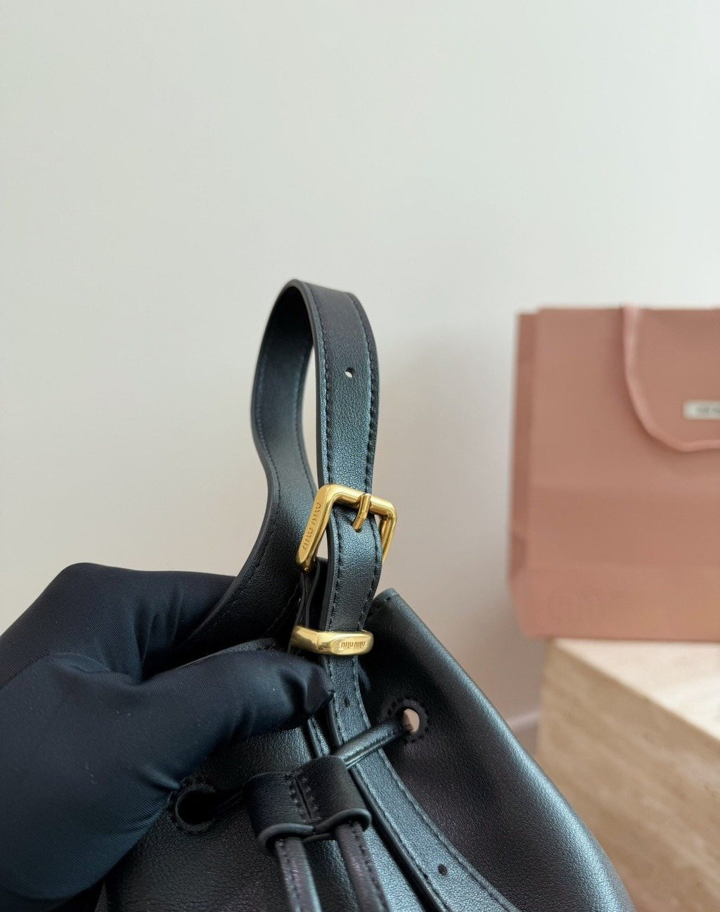 Miu Miu Smooth Leather Drawstring Bucket Bag — detail