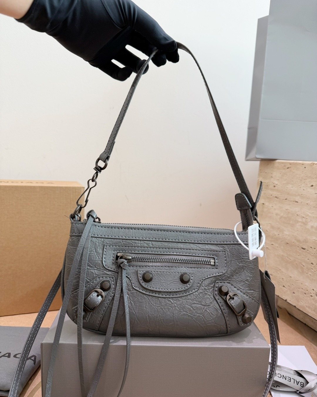 Balenciaga Studded Shoulder Bag with Long Zipper Ties — model