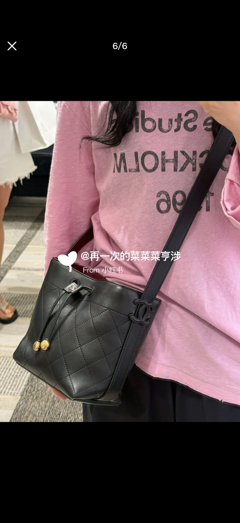 Chanel Diamond-Quilted Drawstring Bucket Bag — model