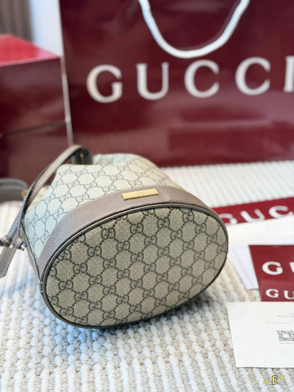 Gucci Monogram Drawstring Bucket Bag — detail